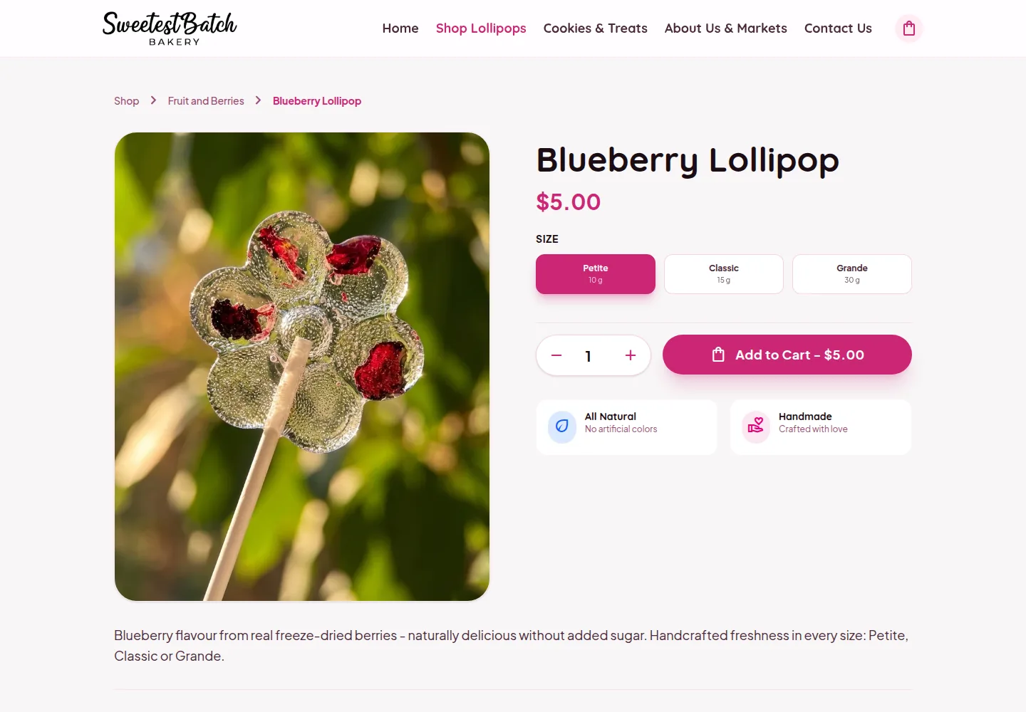 The Blueberry Lollipop product page: a photo of the flower-shaped lollipop with freeze-dried berries, size options from 10 g to 30 g and an Add to Cart button.